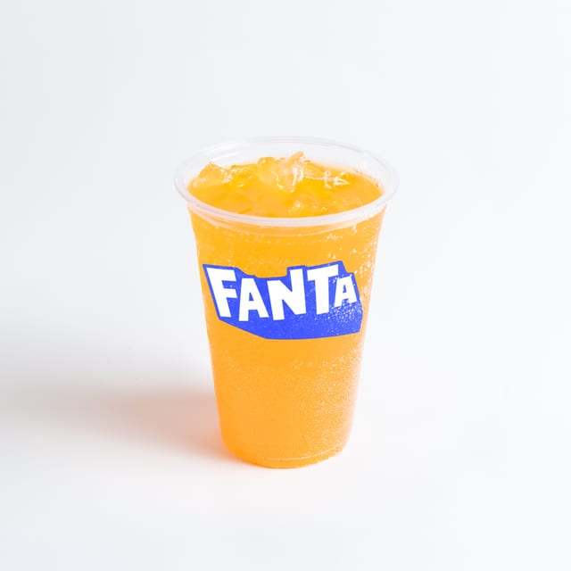 Fanta orange bottled.