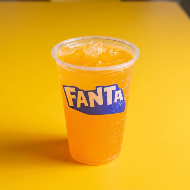 Fanta orange bottled.